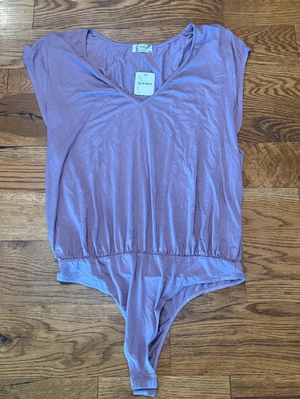 NWT. Intimately Free People. Cap Sleeve Thong Bodysuit. Dusty Purple. Large.